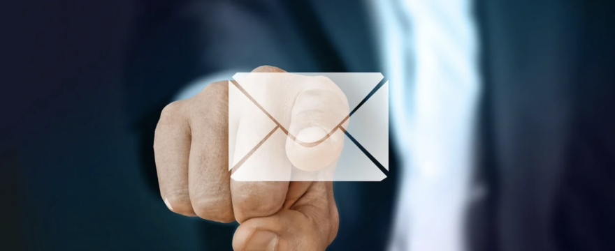 man pointing at an email icon